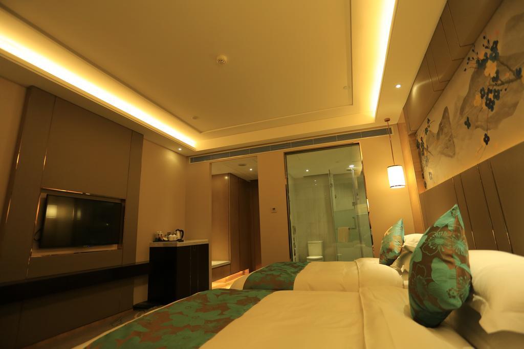 Hotel Ramada Yiyang Taojiang Exterior foto