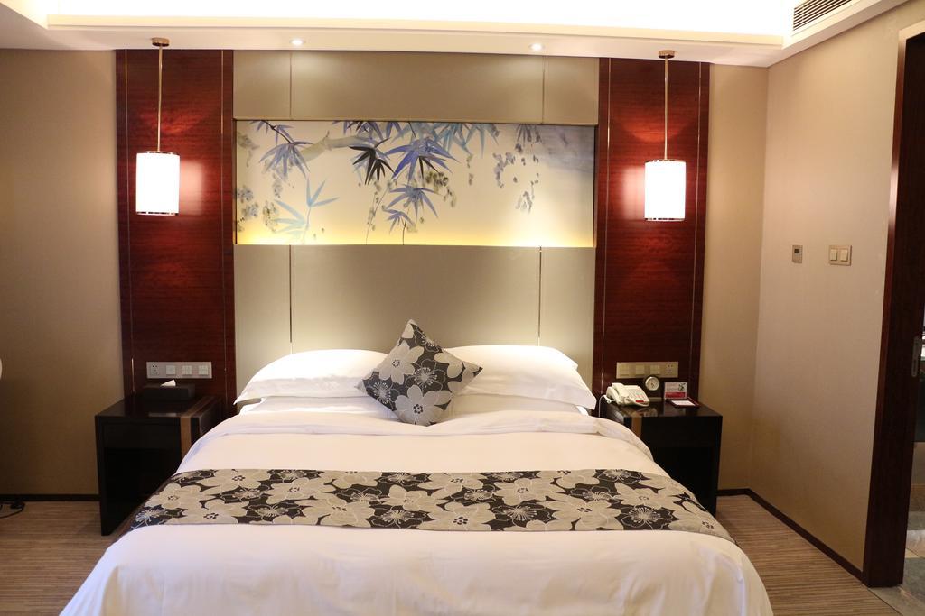 Hotel Ramada Yiyang Taojiang Exterior foto