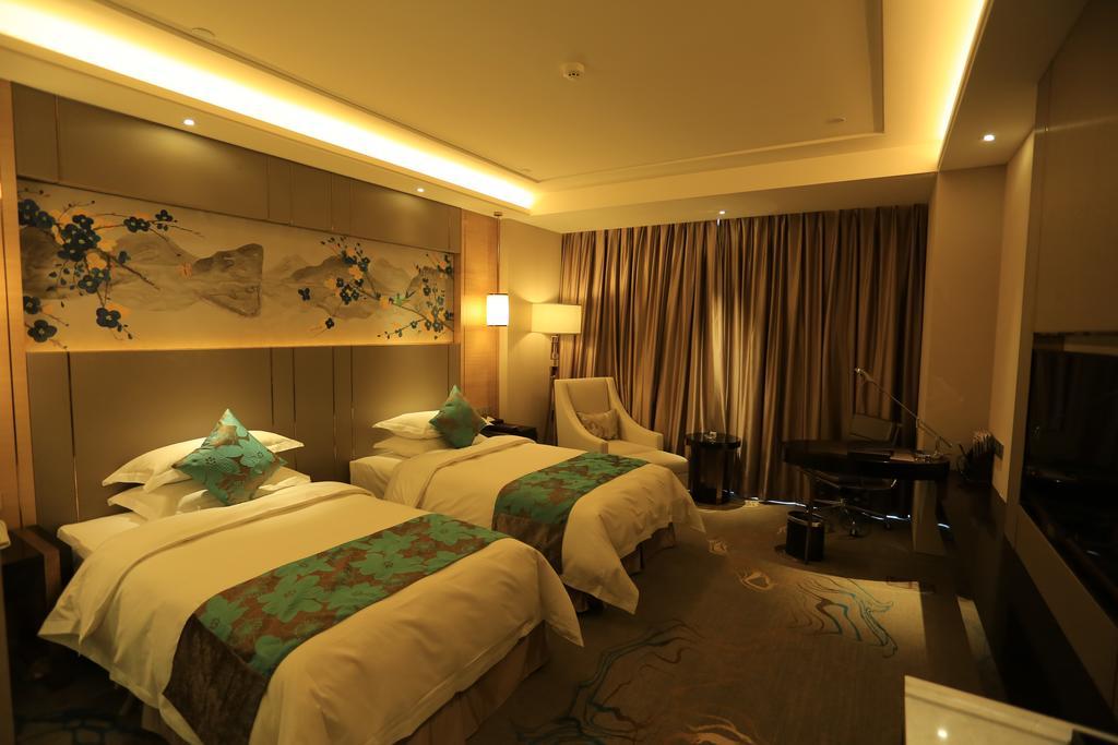 Hotel Ramada Yiyang Taojiang Exterior foto