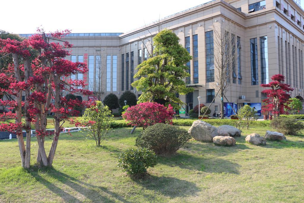 Hotel Ramada Yiyang Taojiang Exterior foto