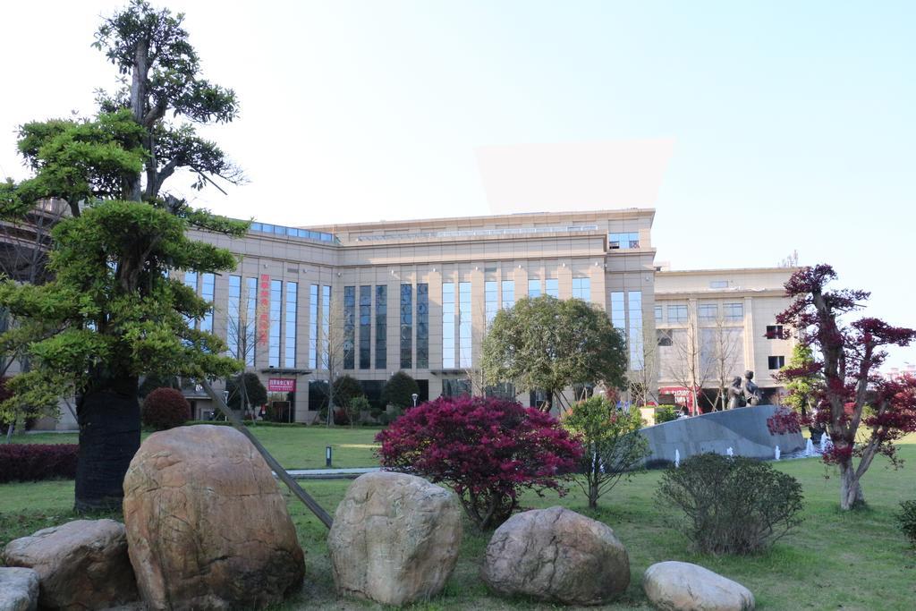 Hotel Ramada Yiyang Taojiang Exterior foto