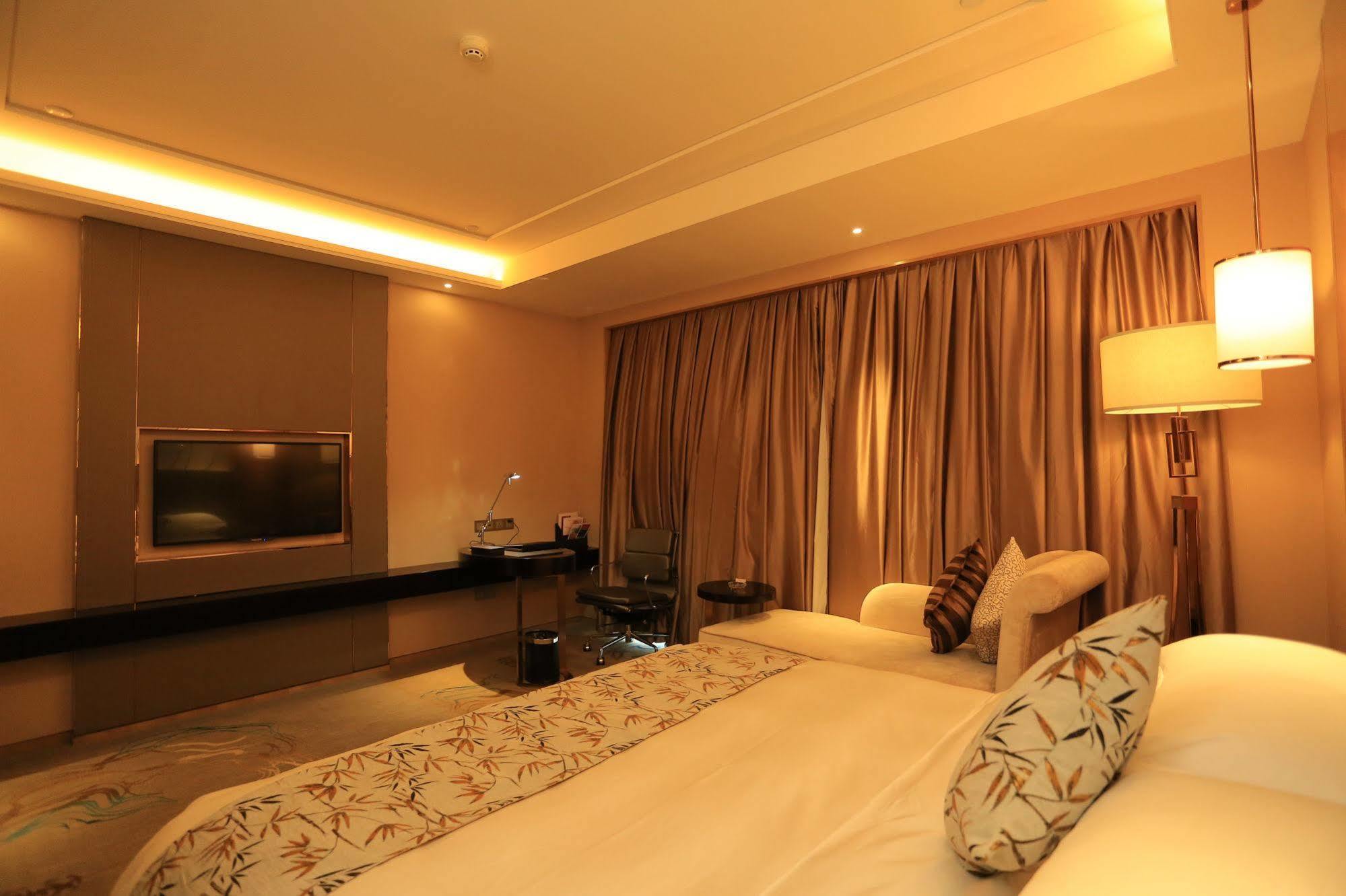 Hotel Ramada Yiyang Taojiang Exterior foto